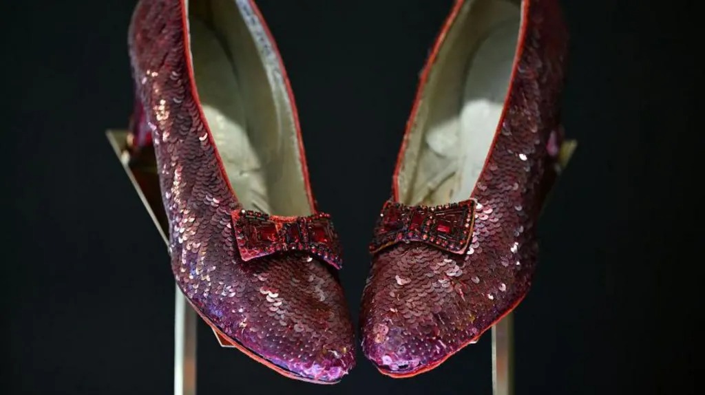 Ensure images reflect the iconic ruby slippers and highlight their Hollywood significance.