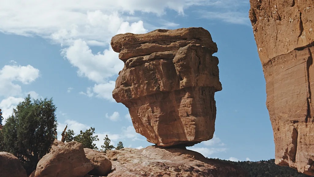 Precariously balanced rock showcasing seismic data clues