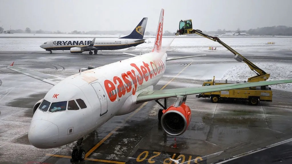 Foggy conditions at Heathrow Airport causing flight delays.