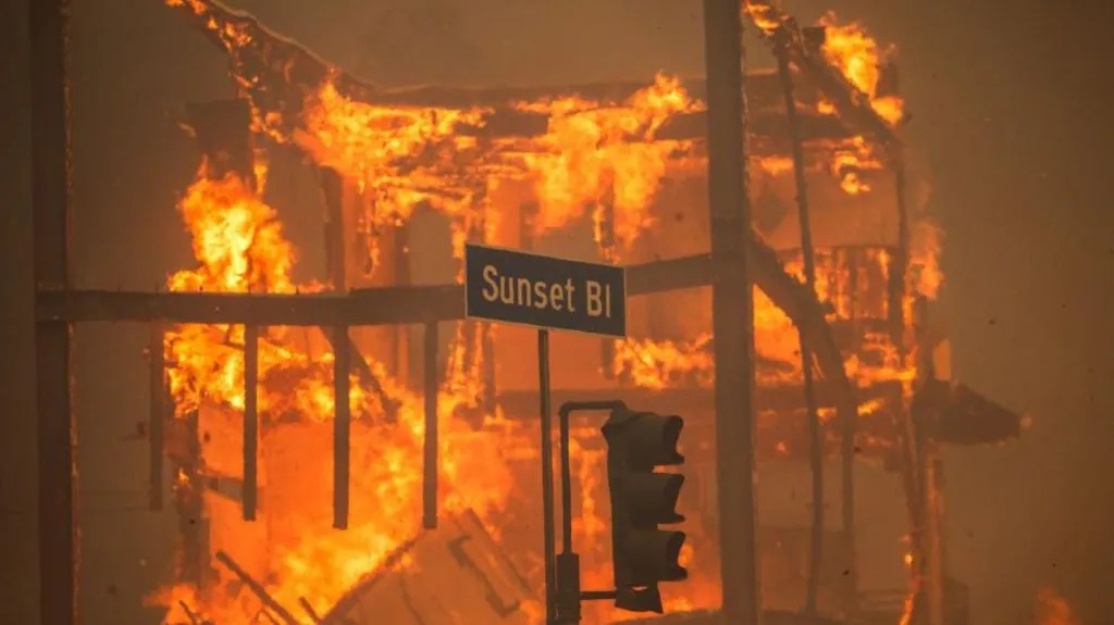 Aerial view of the Los Angeles wildfires causing widespread destruction and damage.