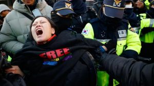 South Korean police confront supporters outside impeached President Yoon Suk Yeol’s home.